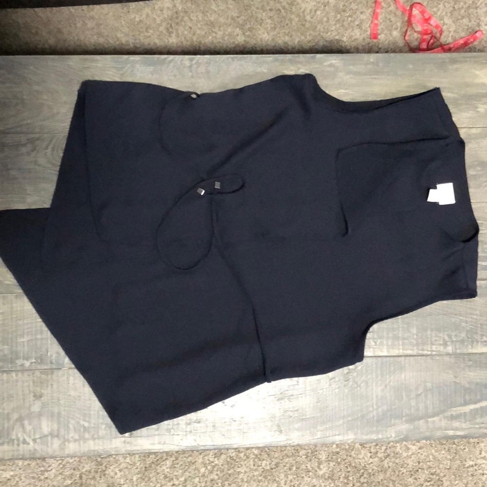 Asymmetrical dark blue vest